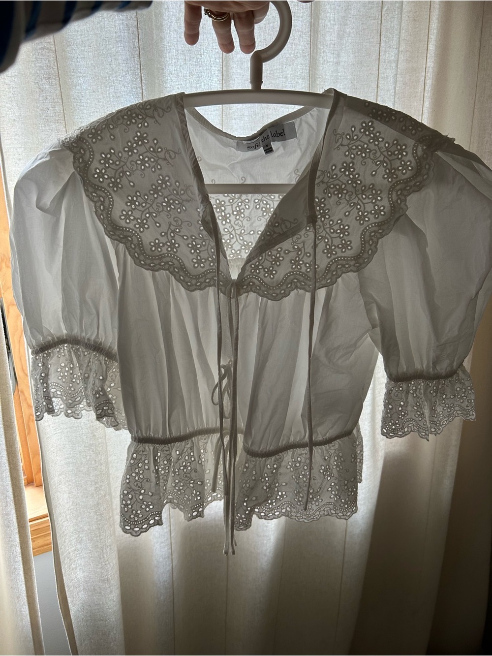 White eyelet top